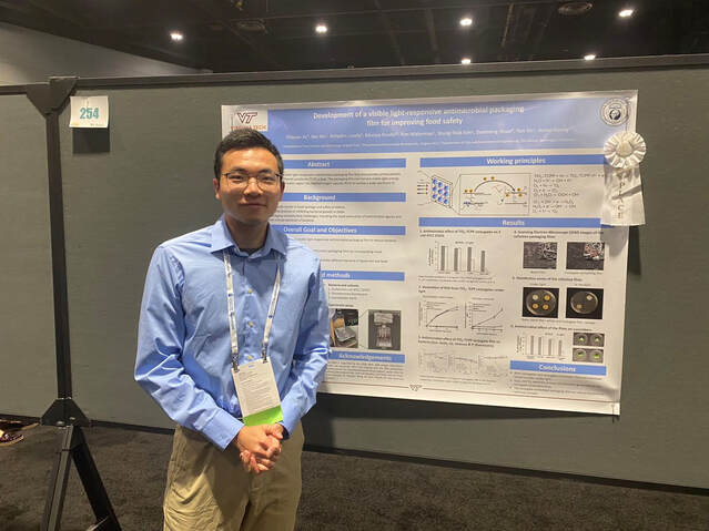 Zane at his poster presentation