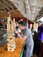 Playing Jenga at Rising Silo Brewery