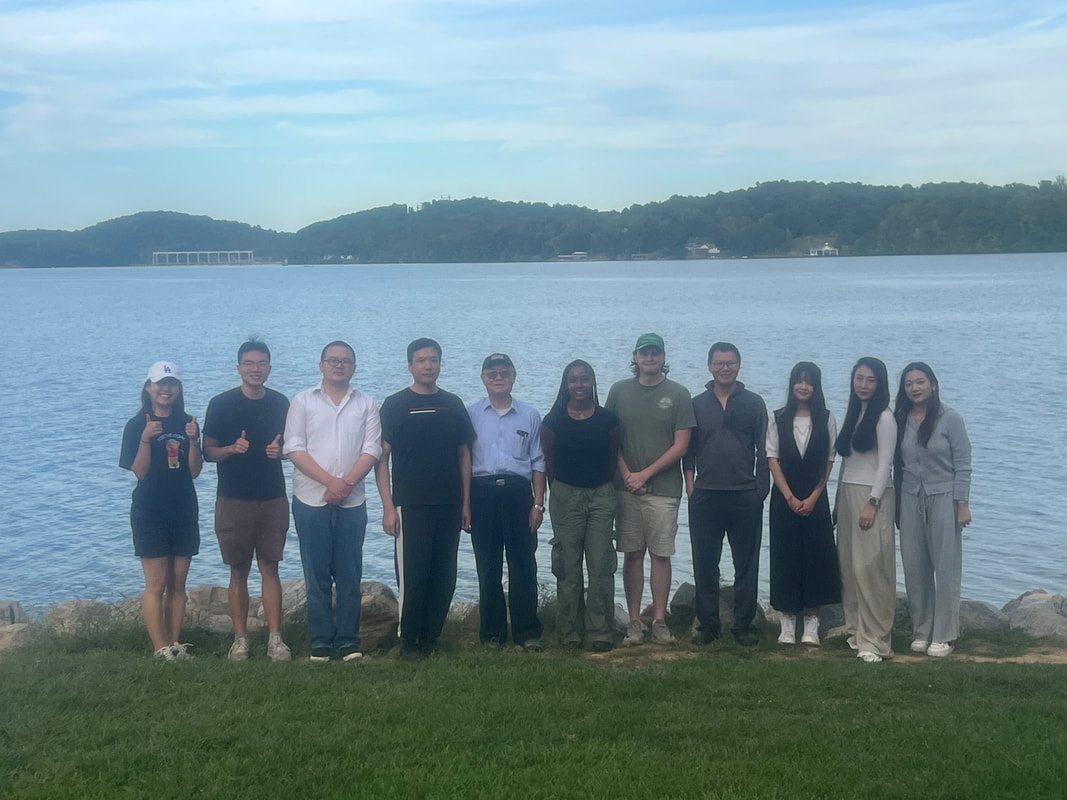Group photo by the lake